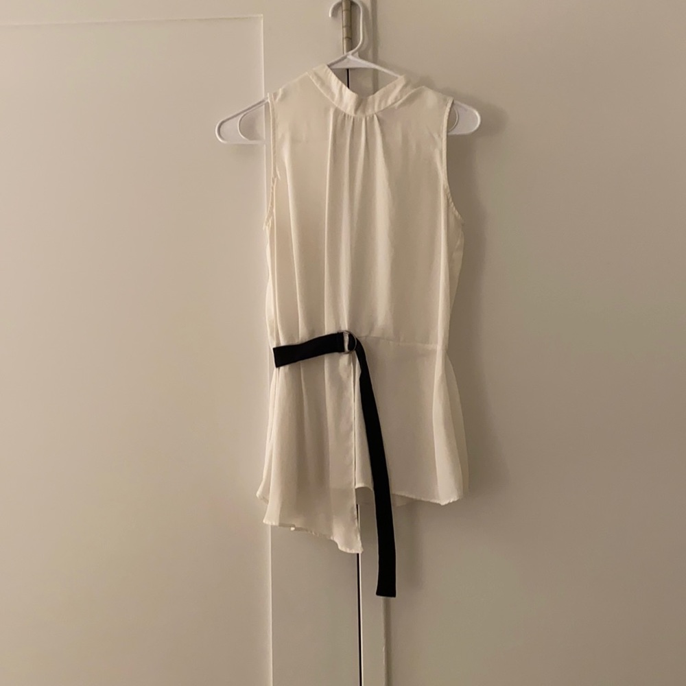 White tank top with black belt st waist